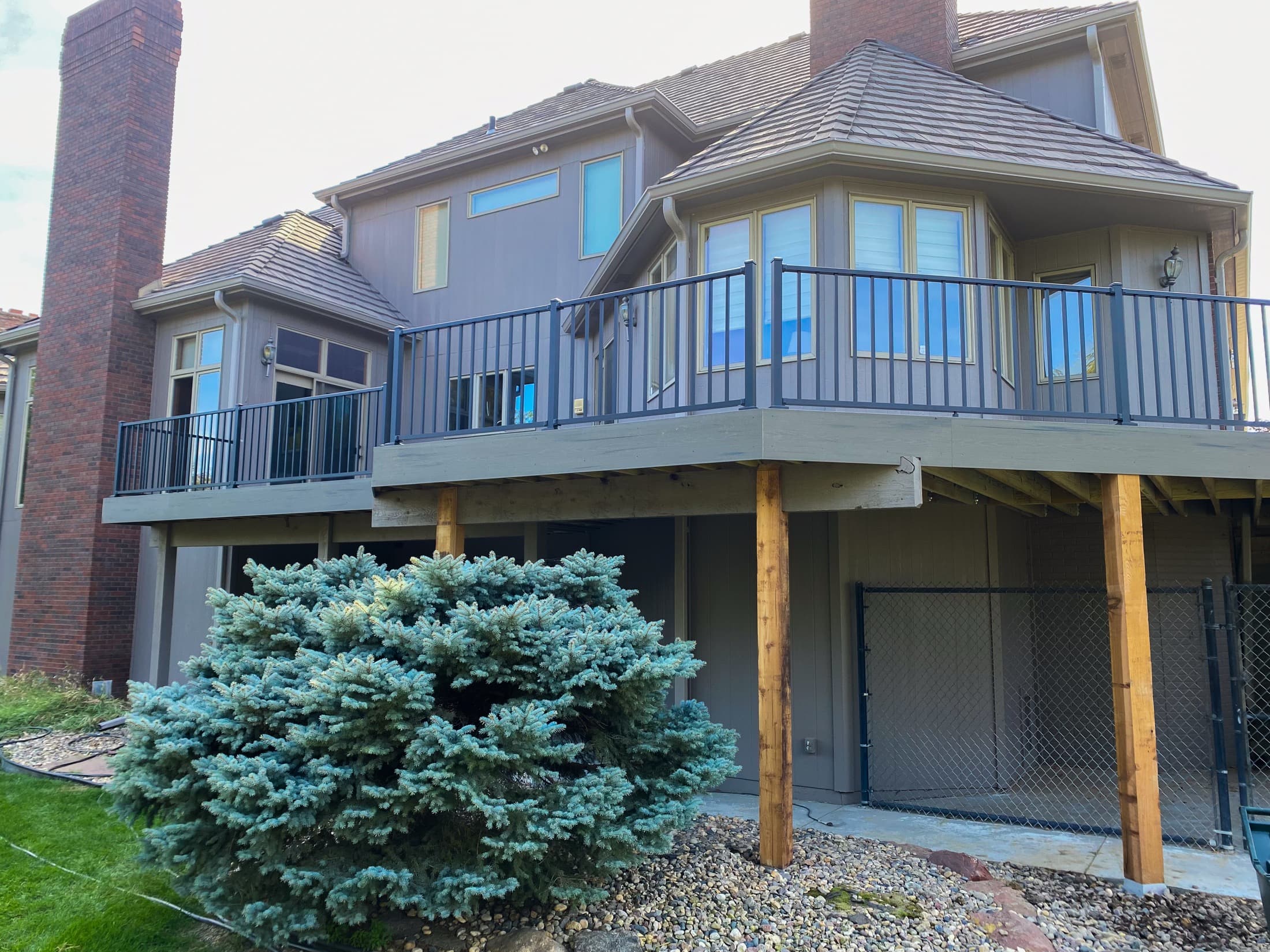 Deck under construction showing structural framing and support posts